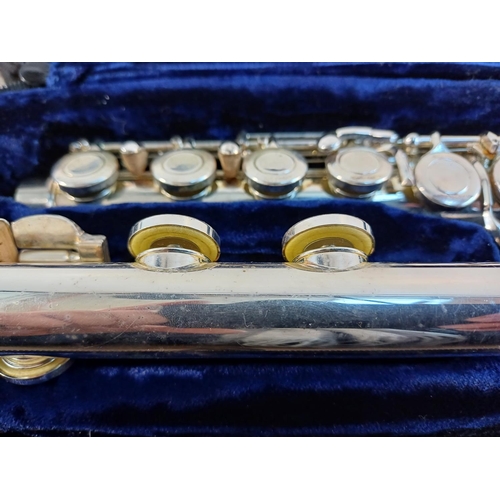 829 - A cased Trevor J. James TJ10x III flute