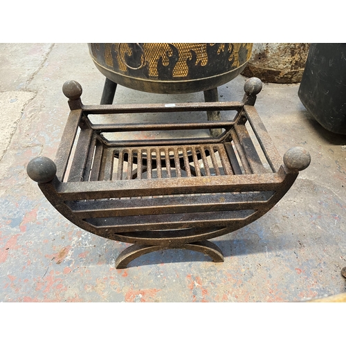 960 - Two items, one cast iron fire grate with griddle and one tri- footed garden fire pit