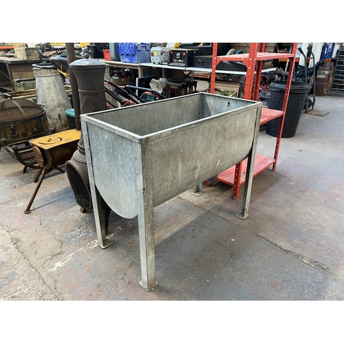 966 - A galvanised feeding trough - approx. 81cm high x 93cm long x 47cm deep