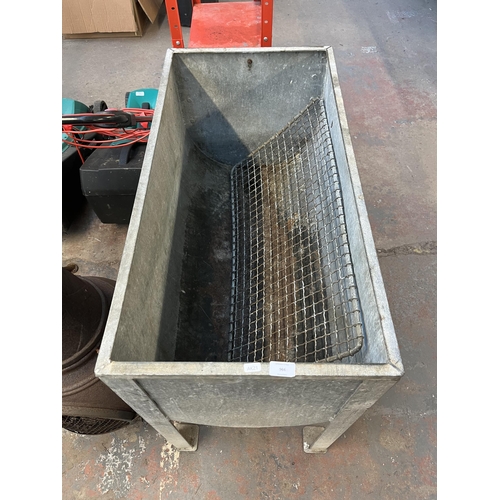 966 - A galvanised feeding trough - approx. 81cm high x 93cm long x 47cm deep