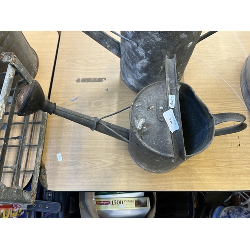 975 - Two vintage galvanized watering cans