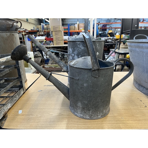 975 - Two vintage galvanized watering cans