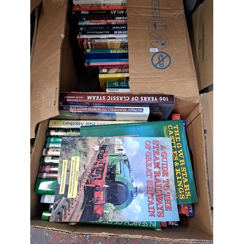 1008 - Seven boxes containing a large collection of British railway related books and DVDs