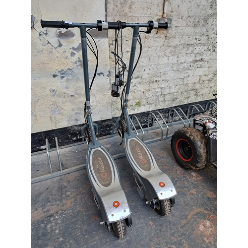 875 - Two Razor electric scooters with chargers