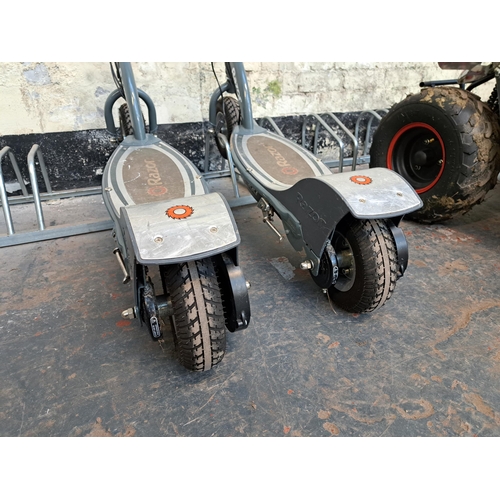 875 - Two Razor electric scooters with chargers