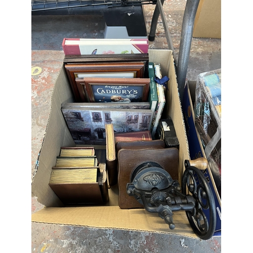 1031 - Three boxes containing sewing materials and knitting books, boxed toys, antique style coffee grinder... 