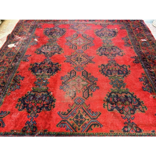 151F - A Persian hand knotted rug - approx. 285cm x 280cm