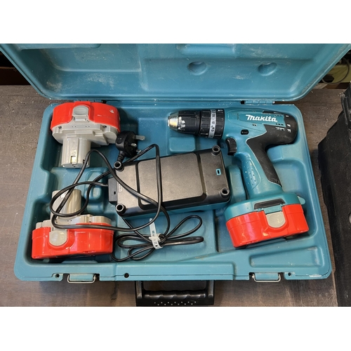 931 - Two power tools, one cased Makita cordless hammer drill with three batteries and charger and one Gar... 