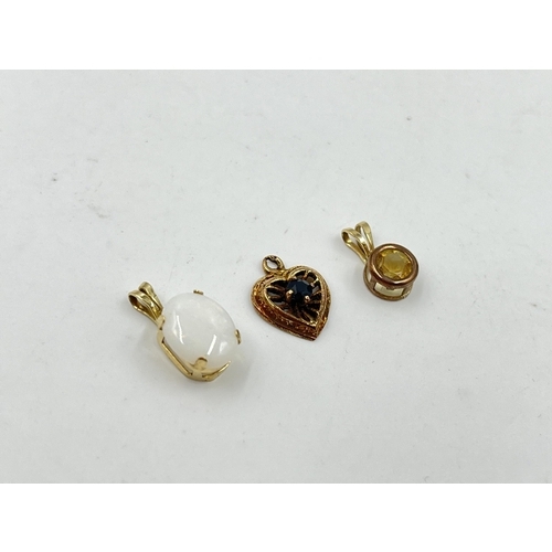 2083 - Three 9ct gold pendants, opal, sapphire and citrine - approx. gross weight 1.3g