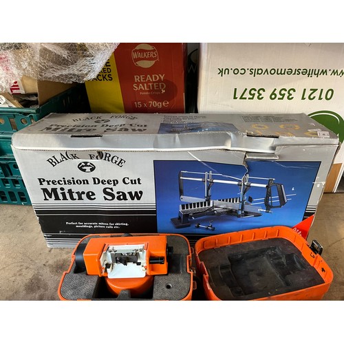 884 - Four items, one boxed Black Forge precision deep cut mitre saw, one Wild Heerbrugg automatic level, ... 