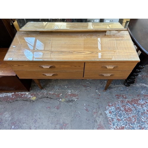 194 - A mid 20th century teak effect dressing table - approx. 120cm high x 126cm wide x 45cm deep