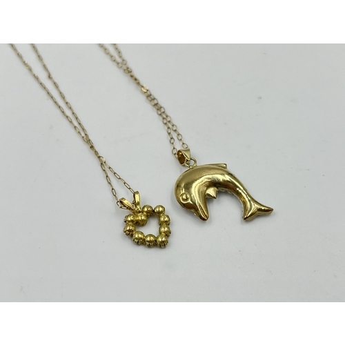 2078 - Two 9ct gold pendant necklaces, one sapphire and CZ and one CZ set dolphin - approx. gross weight 2.... 