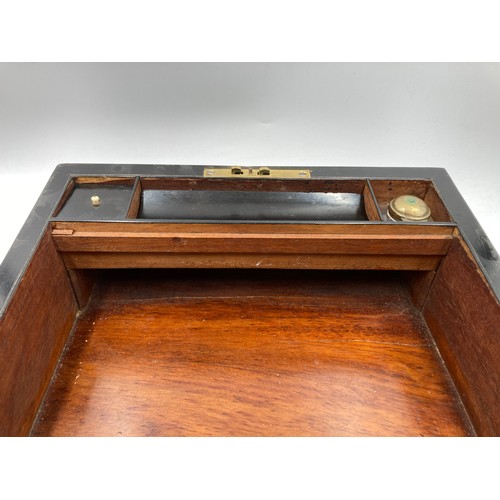 651 - A 19th century burr walnut and marquetry inlaid writing slope with leather insert and inkwell