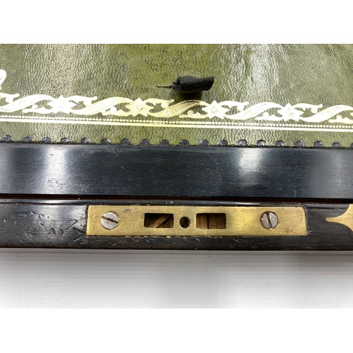 651 - A 19th century burr walnut and marquetry inlaid writing slope with leather insert and inkwell