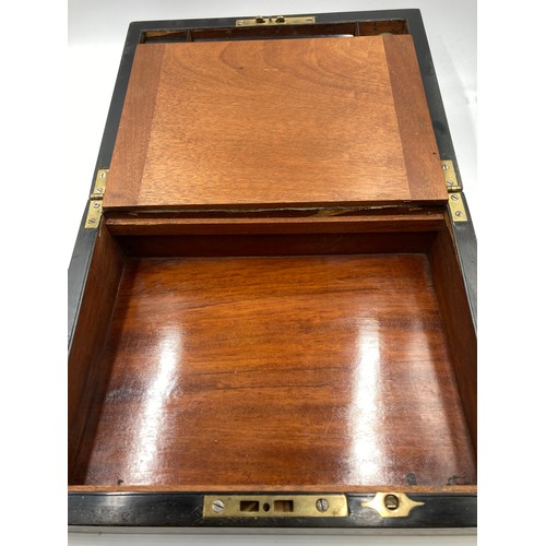 651 - A 19th century burr walnut and marquetry inlaid writing slope with leather insert and inkwell