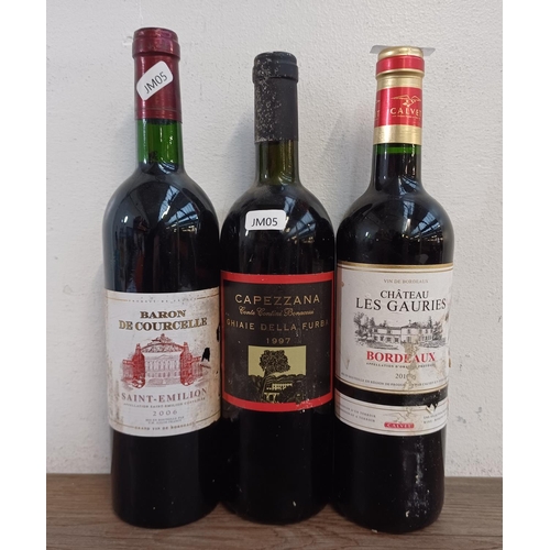 801 - Three bottles of red wine, one 2006 Baron De Courcelle Saint-Émilion, one 1997 Capezzana Ghiaie dell... 