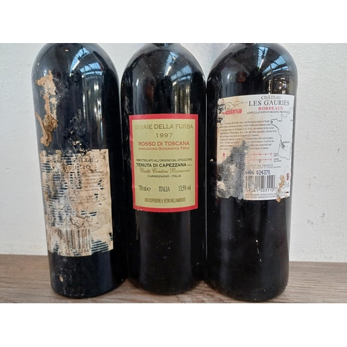 801 - Three bottles of red wine, one 2006 Baron De Courcelle Saint-Émilion, one 1997 Capezzana Ghiaie dell... 