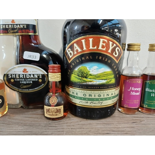 Thirteen bottles, 1L Baileys Irish Cream Liqueur, Sheridan's Coffee