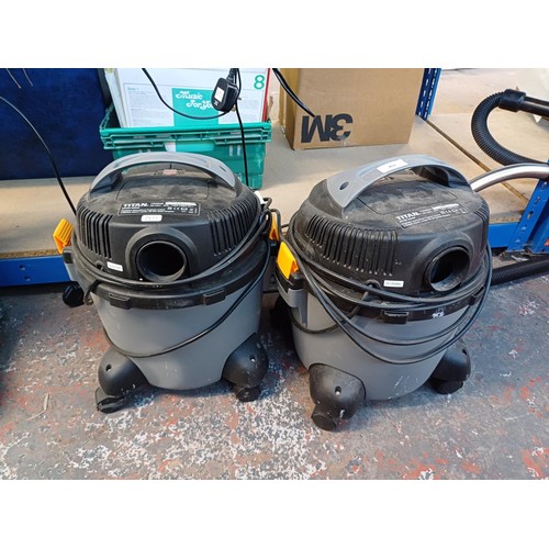 1058 - Two Titan 19W28 wet and dry vacuum cleaners