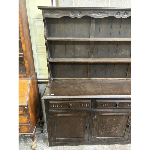 13 - A mid 20th century carved oak dresser - approx. 183cm high x 183cm wide x 43cm deep