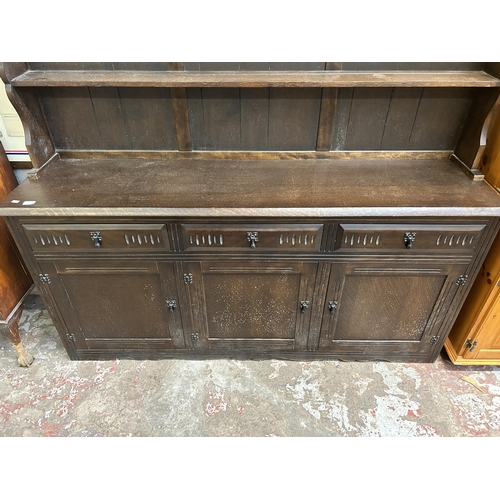 13 - A mid 20th century carved oak dresser - approx. 183cm high x 183cm wide x 43cm deep