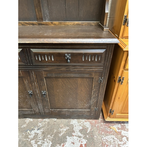 13 - A mid 20th century carved oak dresser - approx. 183cm high x 183cm wide x 43cm deep