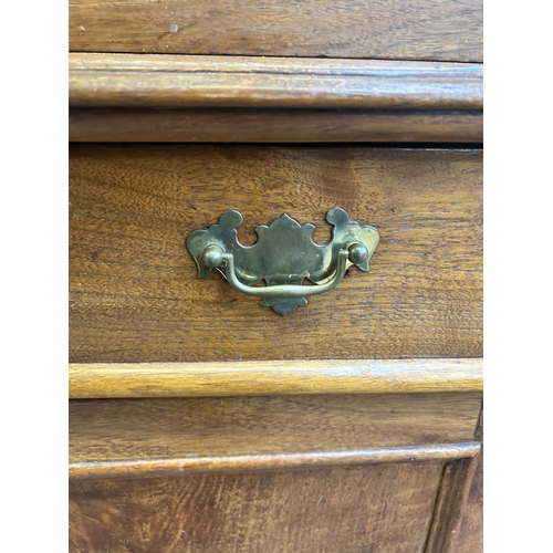 16 - A Victorian satinwood bookcase with two upper glazed doors and two lower cupboard doors - approx. 22... 