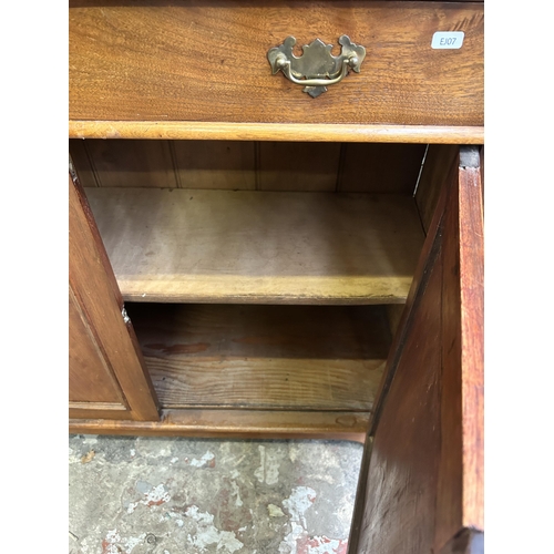 16 - A Victorian satinwood bookcase with two upper glazed doors and two lower cupboard doors - approx. 22... 