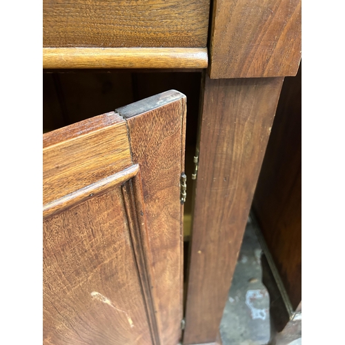 16 - A Victorian satinwood bookcase with two upper glazed doors and two lower cupboard doors - approx. 22... 