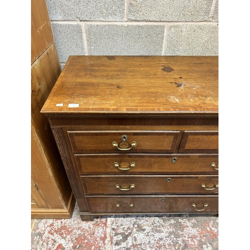 30 - A George III oak and mahogany crossbanded chest of drawers on bracket supports - approx. 102cm high ... 