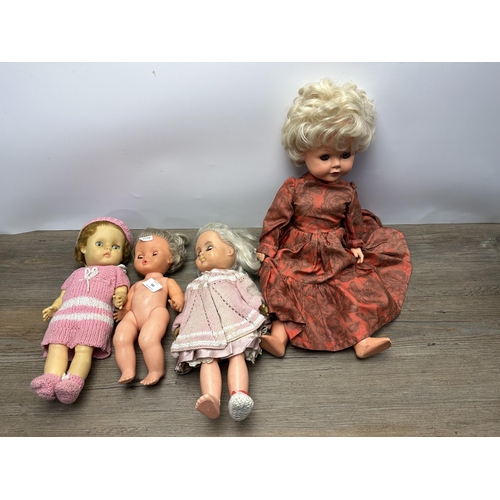 591 - Four vintage dolls