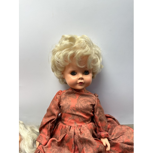 591 - Four vintage dolls