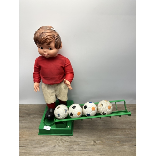 593 - A mid 20th century Geyper battery powered mechanical football toy