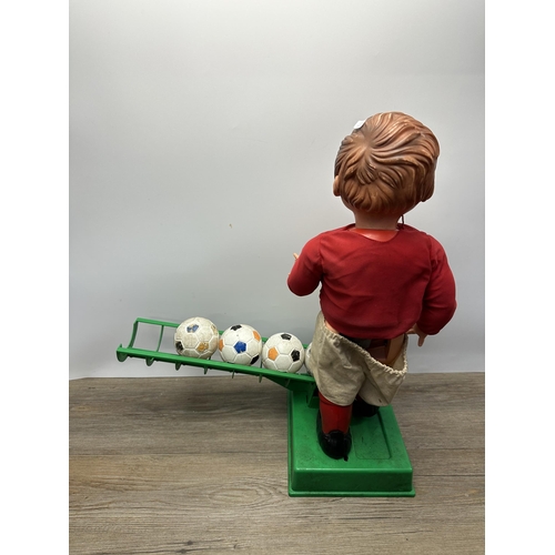 593 - A mid 20th century Geyper battery powered mechanical football toy