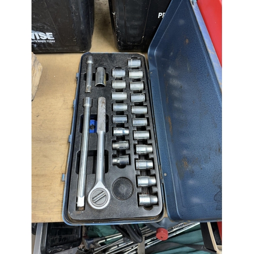 1150 - Two metal cased socket sets