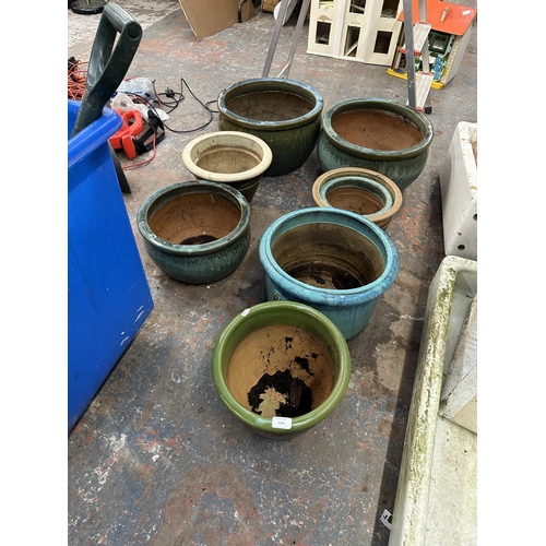 1174 - Eight drip glazed terracotta planters