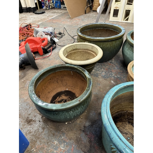 1174 - Eight drip glazed terracotta planters