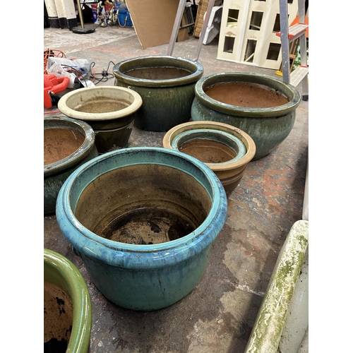 1174 - Eight drip glazed terracotta planters