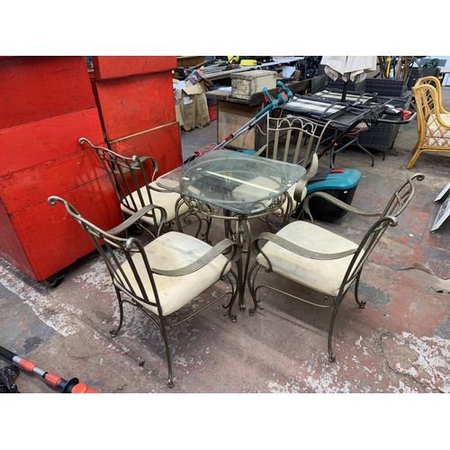 1178 - Five piece wrought iron outdoor table and chair set comprising four chairs and table