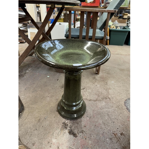 1187 - A glazed terracotta pedestal bird bath