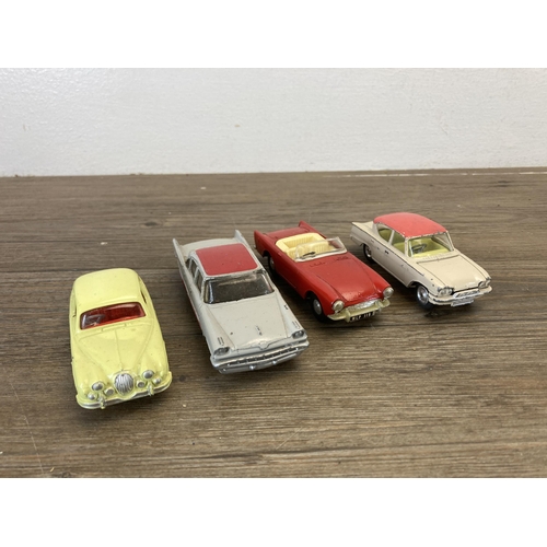 585 - A collection of vintage die-cast model vehicles to include Thunderbirds guided missile, Corgi E-type... 