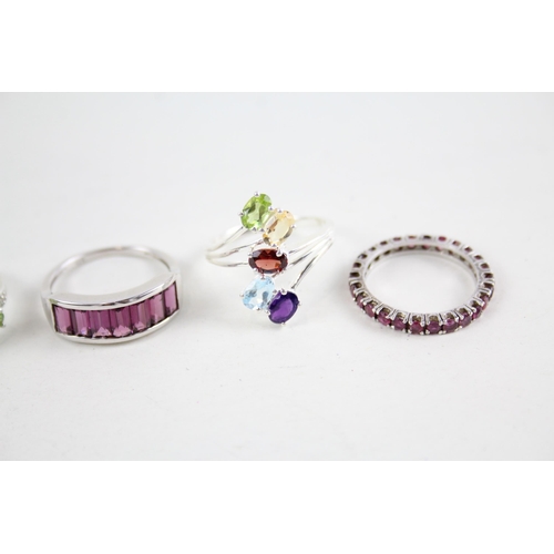 2046 - Eight silver gemstone set rings to include ruby, peridot etc. - approx. gross weight 24g