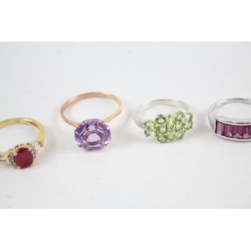 2046 - Eight silver gemstone set rings to include ruby, peridot etc. - approx. gross weight 24g