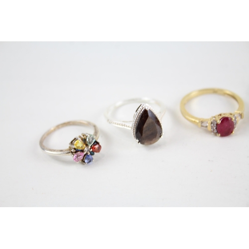 2046 - Eight silver gemstone set rings to include ruby, peridot etc. - approx. gross weight 24g