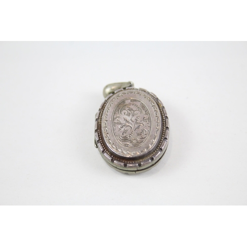 2048 - Two Victorian silver lockets - approx. gross weight 30g