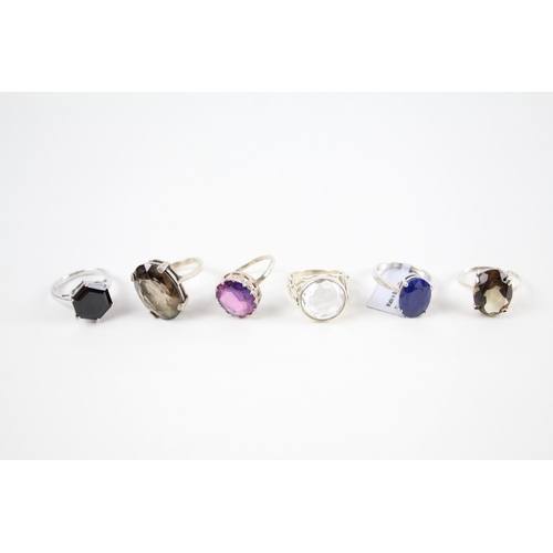 2058 - Six silver gemstone set cocktail rings - approx. gross weight 27g