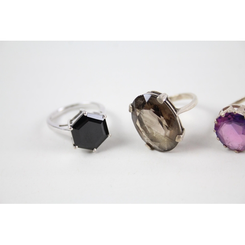 2058 - Six silver gemstone set cocktail rings - approx. gross weight 27g