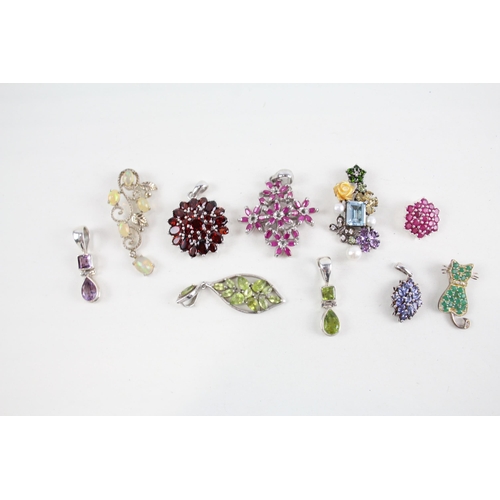 2064 - Ten silver gemstone set pendants to include ruby, tanzanite etc. - approx. gross weight 39g