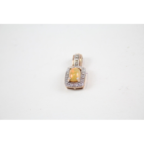 2079 - Eight silver gemstone set pendants to include sapphire, opal etc. - approx. gross weight 50g