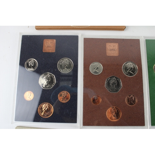 2207A - Four The Coinage of Great Britain and Northern Ireland proof coin sets, 1974, 1975, 1976 and 1977